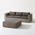 Ogrodowy zestaw z technorattanu szarobrązowy z ciemnoszarymi poduszkami, sofa 220 × 85 × 75 cm i stolik 120 × 70 × 40 cm